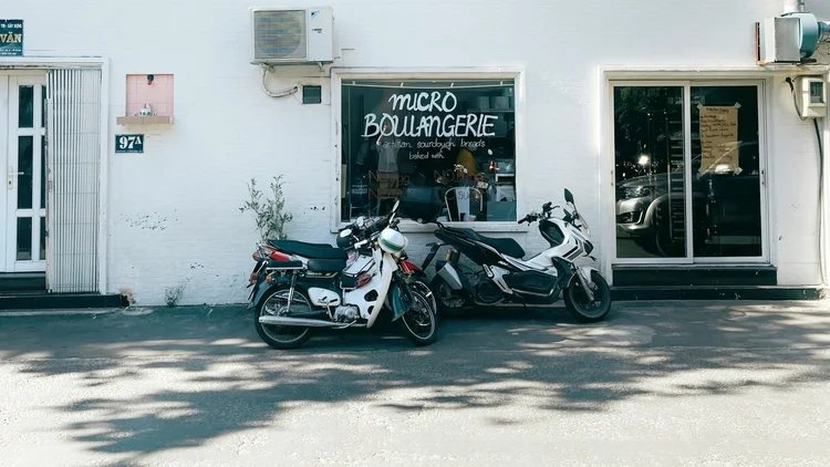 Motorcycles parked outside the bakery